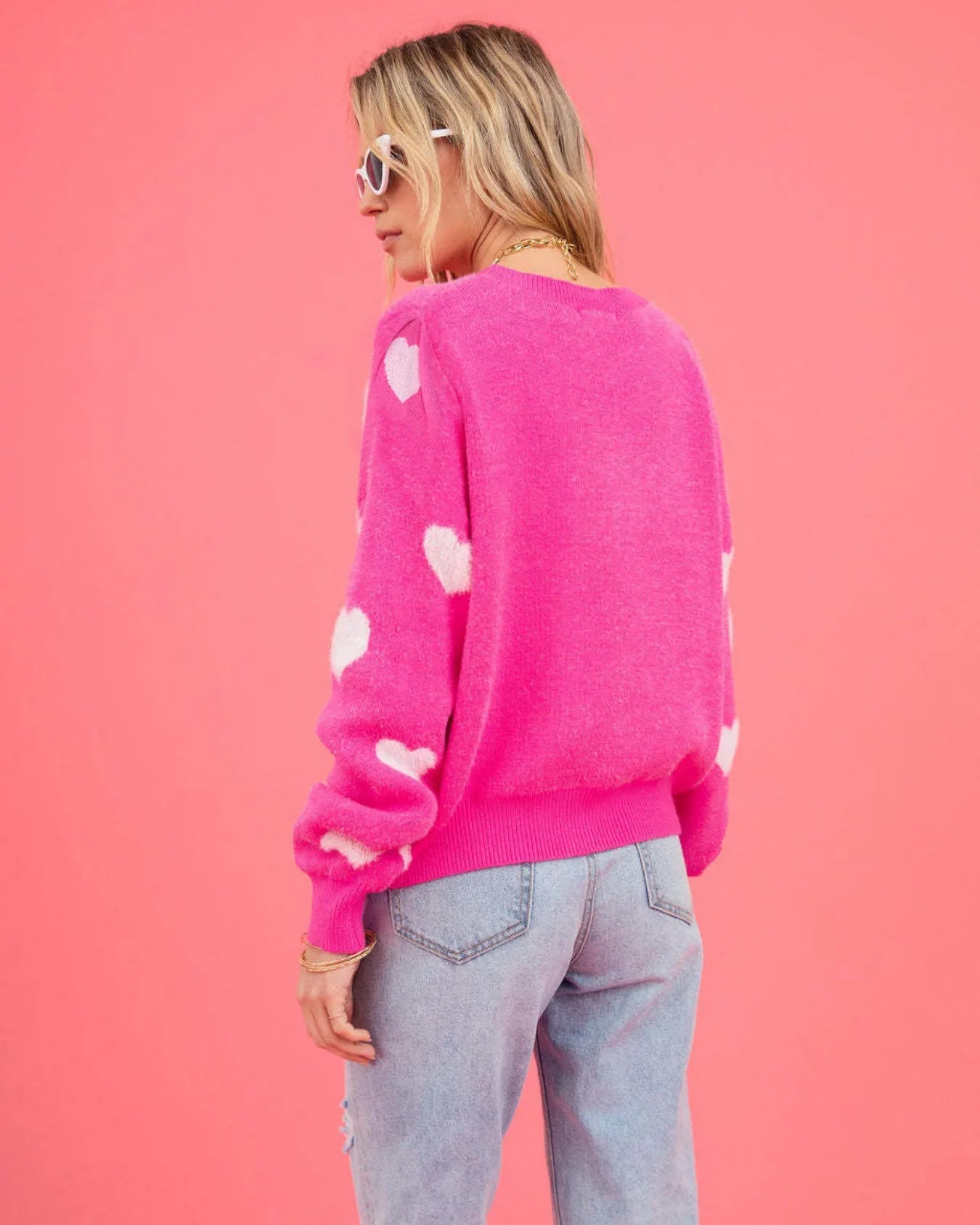 Elevate Your Casual Wardrobe with Our Hot Pink Oversized Knit Sweater Featuring a Charming Heart Pattern