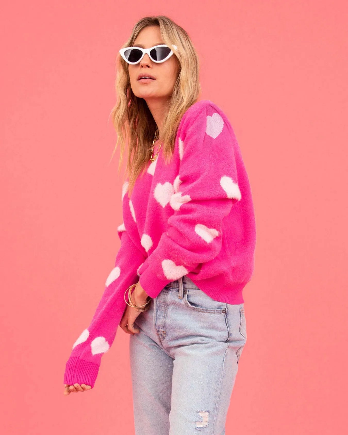 Elevate Your Casual Wardrobe with Our Hot Pink Oversized Knit Sweater Featuring a Charming Heart Pattern